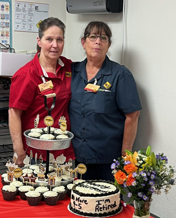 Lowe's Manager Jacque Wilson (left) with Bernita Thompson