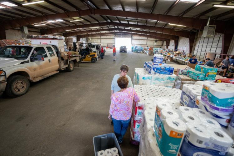 The Hemphill County Exhibition Center has filled with donated goods ranging from toilet paper to water and toiletries to animal feed. About 40 volunteers have helped to bring in and distribute the goods on behalf of the Texas A&M AgriLife Extension Service in Canadian. (Sam Craft/Texas A&M AgriLife)