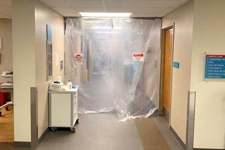 This was the 200 Hall at Hemphill County Hospital in November of 2020. The entryway was draped in plastic, marked with signs warning visitors not to enter. The hall—which had been converted to serve as the hospital’s COVID Unit—was restricted to medical personnel and the acute care patients who were hospitalized there. Local doctors were warning the public that if they had a heart attack or stroke, and were taken to Hemphill County Hospital, they would not be transferred to an acute care unit elsewhere beca