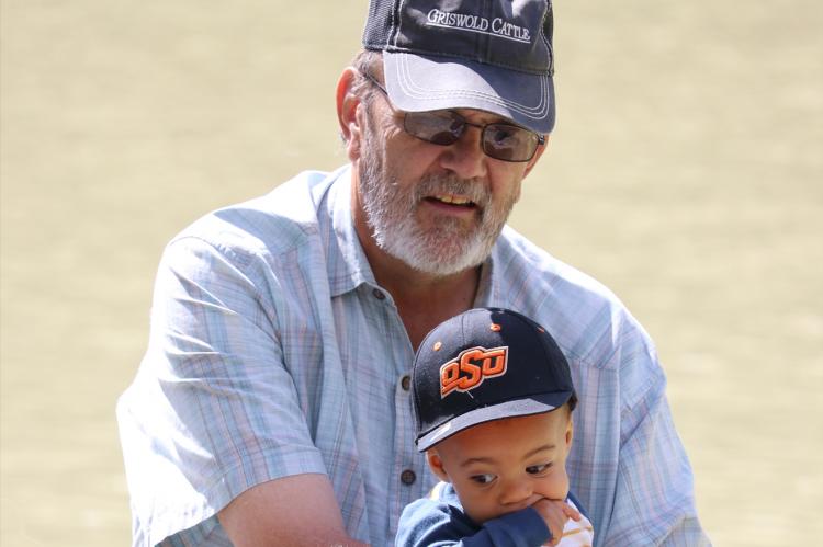 Doug is shown here with one of his grandsons, 4-year-old Kixon Douglas Benge, the son of daughter Sydni.