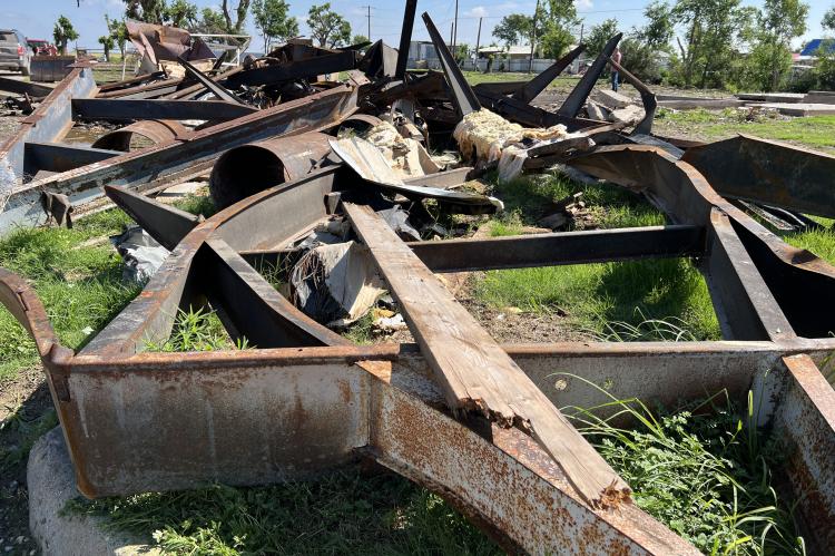 Little but twisted debris remains of this mobile home park following the tornado
