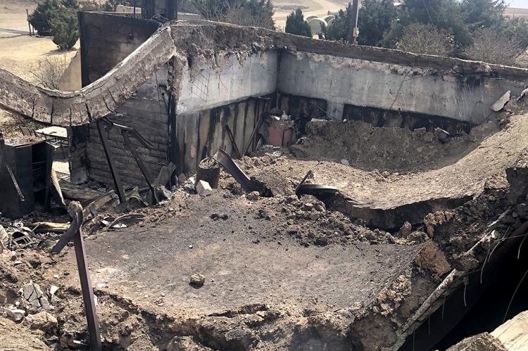 Concrete walls and giant I-beams proved no match for the fire