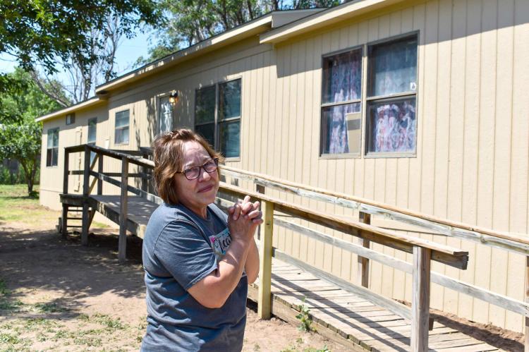 Luz Flores at her new home
