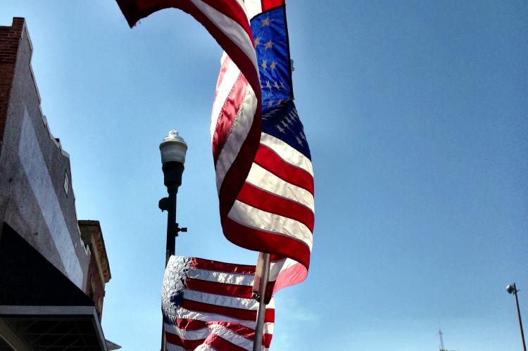 Canadian Rotary Club flags line Main Street on Memorial Day