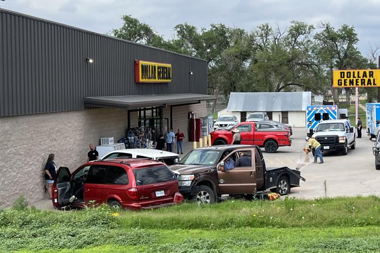 Floyd's pickup was rear-ended and propelled into the parking lot, where it struck two other parked vehicles