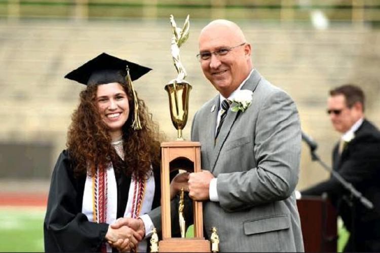 SUPERINTENDENT KYLE LYNCH PRESENTING 2019 LISKE CUP TO GRACE ABRAHAM