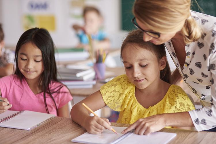 Teacher with students