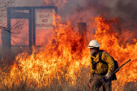 Firefighters battle the blaze
