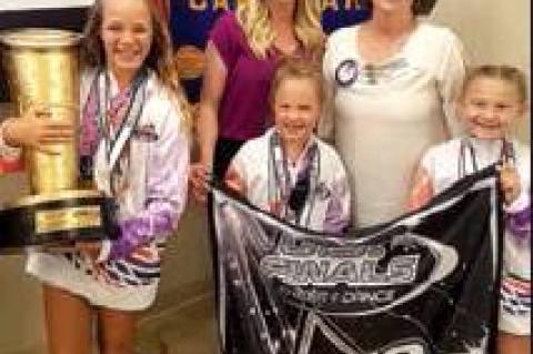 ALL-STARS: McKenzie Pshigoda and Rotarian Ronda Bartlett (in back); (front) Olivia Flowers, Kaylee Richardson, and Harper Spencer