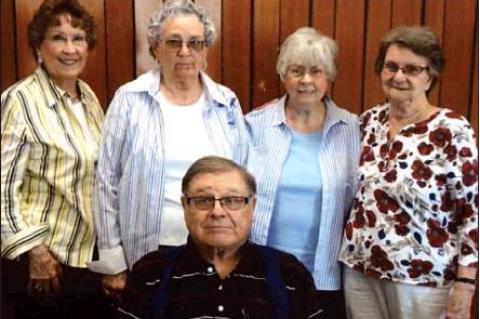 The class of 1956: (back row, l-r) guest, Donna Kragh Wit (class of 1956 Waynoka, Oklahoma, and wife of the late Vic Wit), Joan Curry Nichols, Wilma Wit, and LoEtta Chumbley Killgore; and from the class of 1957, seated, Rolla Shaller.