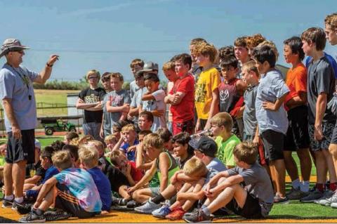 ROLE CALL: Head football coach Chris Koetting explains the role that each player is expected to carry in his program, during Tuesday morning drills.
