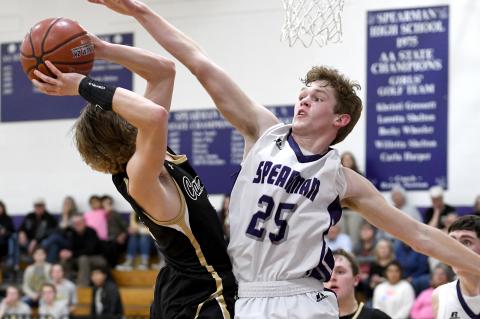 Twister Kelton (3) goes up against Spearman's Eduardo Linares (25)