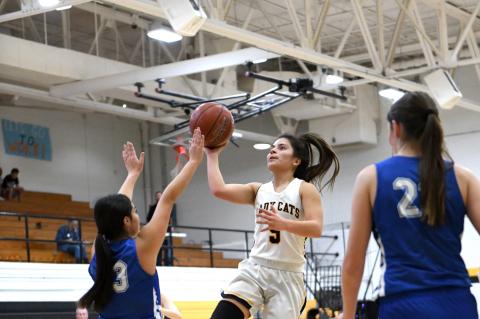 Lady Cat #5 Jasmyn Moreno catches some air for a layup in Canadian’s loss to Childress on December 10.