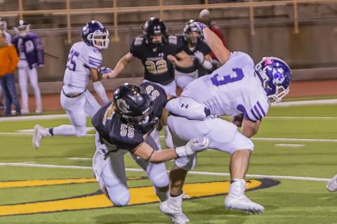 Wildcat defensive lineman Rhet Pennington (55) stops Dimmitt’s Trey Aguero (3) behind the line of scrimmage. 