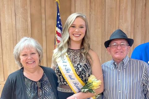 Abby Isom and parents, Jeff and Brittany Isom