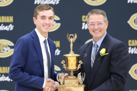 Supt. Lynn Pulliam presents Abraham Award to Bridger Burrus
