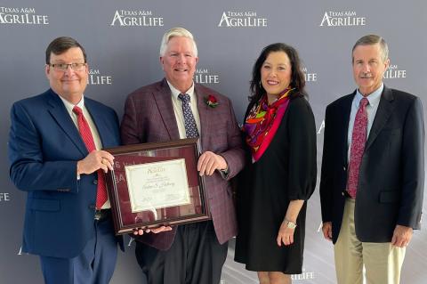 Dr. Mark Hussy, interim vice chancellor and dean of agriculture at Texas A&M University; Hemphill County Extension Agents Andy and Tanya Holloway; and Hemphill County Judge George Briant