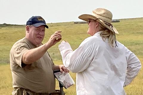 Beth Ramp Sturgeon examines .52 caliber Spencer bullet found by Chris Larson