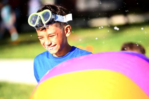 Roberto Alvarez enjoys some relief from the heat in the CCC pool