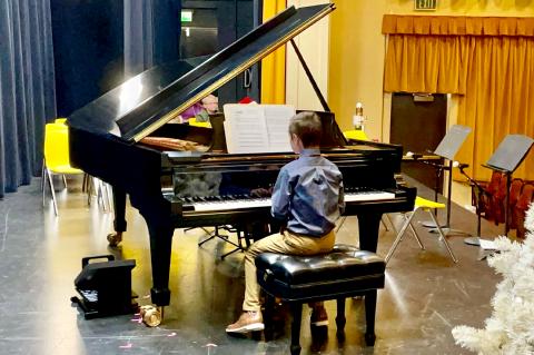 Pianist Thatcher Cook performing at Sunday's CAA Christmas Concert