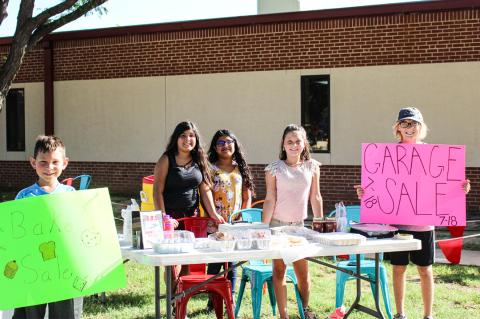 Community Center volunteers (from left) Wyatt Longoria, Sophia and Jasmine Avila, Maddie Longoria and Tucker Landry.