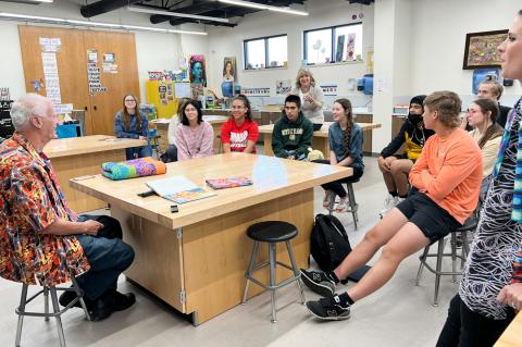 Featured Citadelle artist George Mendoza with high school art students