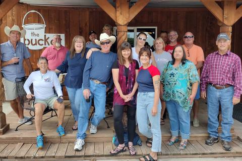 Trey Webb, Beth Guidry, Dean Thompson, Janae Schafer, Jimmy Goebel (and wife Shelley), Jimmy Mathews, Ima Munson Heim (and daughter Rachel), Sherri Cecotti, Rhonda Christopher Gallager (and husband Monty), Rowdy Welch (and wife Cathy), Janis Longhofer Ries, and Keith Schoenhals. Missing from the photo is Angie Abernethy.