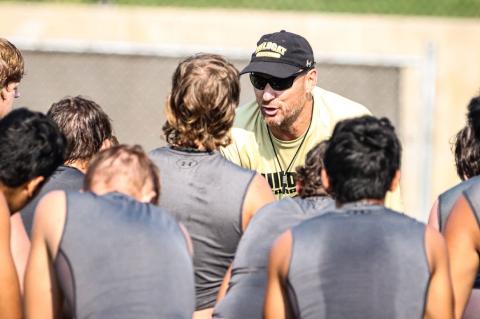 Canadian Wildcat Defensive Coordinator Andy Cavalier speaks to his players