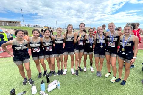 Lady Cat cross-country team following Canyon 6-Mile Relay Chicken Run