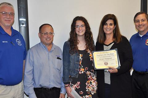 Three representatives from United Supermarkets and Amarillo Custom Box Company were on hand for the Teachers on the Rise presentation last Thursday. Pictured are Bryan Hill, Brad Smith, CHS senior Carleigh Thompson, CHS teacher Jacqui Haygood, and Shane Sumrow.