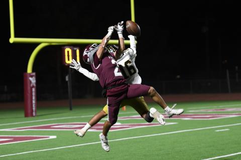 Julian Dominguez (16) knocks down pass intended for Brayden Franco (2)