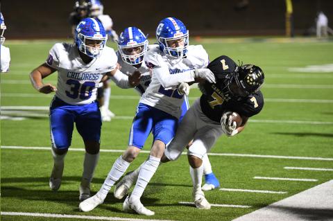 Wildcat Nick Salas (7) is muscled out of bounds by Aiden Allen (22)