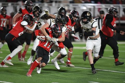 Jake Krehbiel (22) wraps up Sonora running back Hunter O'Banon (11)