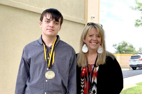 Gold medalist Logan Gatlin and Debate Coach Christy White