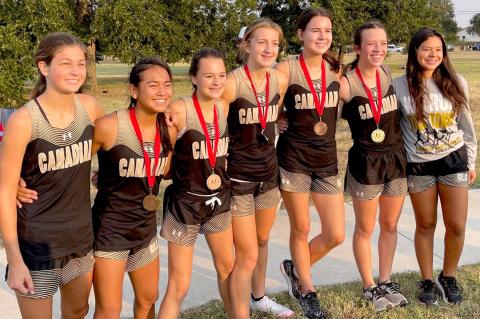 Lady Cat cross-country runners Brooklyn Beedy, Elizabeth Guerrero, Payton Lee, Arionna Black, Ella Walser, Konnar McClendon, and Kathia Aragon