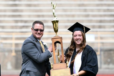 CISD Superintendent Lynn Pulliam presents Liske Cup to Peyton Dockray