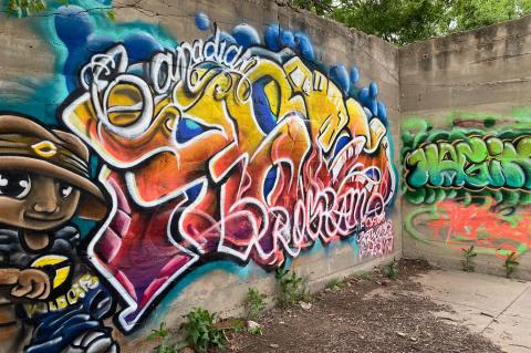 Gavin Grinie leaves his mark on the old Canadian High School ruins