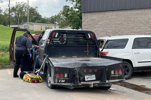 John Floyd's flatbed pickup was rear-ended by semi