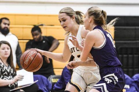 Parker Lee (3) outdrives RR's Brenin Shannon (10) to the basket