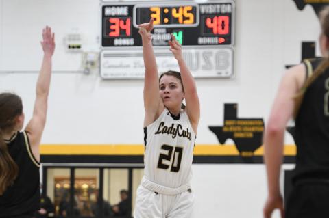 In 4th-quarter rally, Tinley Pennington (20) shoots from the top of the key