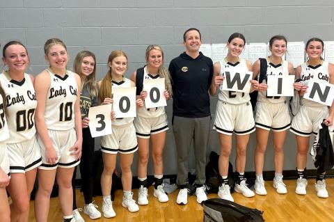 CHS Coach Aaron Marks celebrates his 300th career win with the Lady Cat varsity