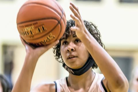 Lady Cat Mattie Boyd lines up a shot in Tuesday's win over Bushland