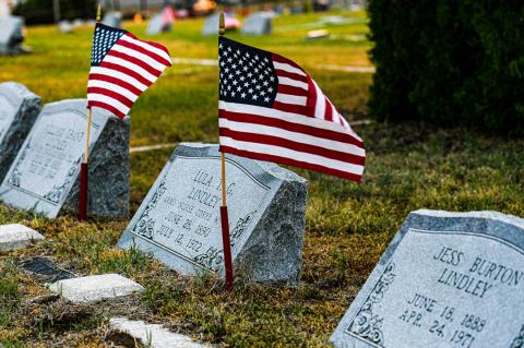 This photo, taken at sunrise on Memorial Day, shows the Lindley family plot, with Lula Dawson Lindley at the center. 
