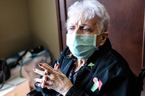 Eva Timmons surveys her new room at Mesa View Senior Living Thursday afternoon, as her daughter waits nearby to help her unpack some of the boxes that made the short trip from the Edward Abraham Nursing Home to her new digs. PHOTO BY LAURIE EZZELL BROWN | THE RECORD