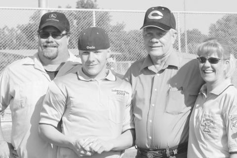 In this June 1993 photo, Larry Dunnam stands with his family, Rocky, Shane, and Darlene