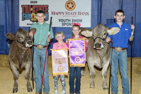 Colt Pittman with reserve grand, Addison Pittman, Cambree Pittman, and Coy PIttman with Colt’s grand champion