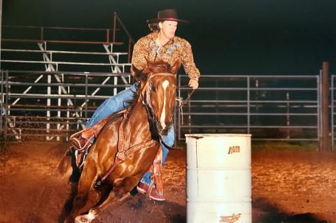 Reinhardt riding Yessir Imareddie at Purcell Pro Rodeo