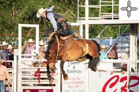 Saddle Bronc Rider Benny Proffitt puts on an aerial show