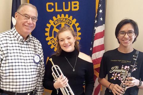 Rotarian Frank Pankratz with CHS Band members Abi Black and Leo Avila