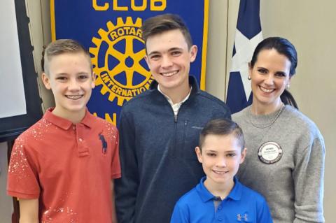 Everett Cook (center) with Collier, Thatcher, and Wendie Cook